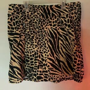 DKNY Golf animal print golf skirt in size 12. 97% polyester 3% spandex